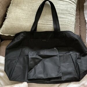 Tumi voyager black just in case tote